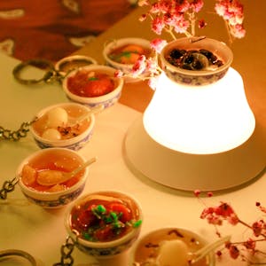 الة حاسبة صغيرة ميدالية